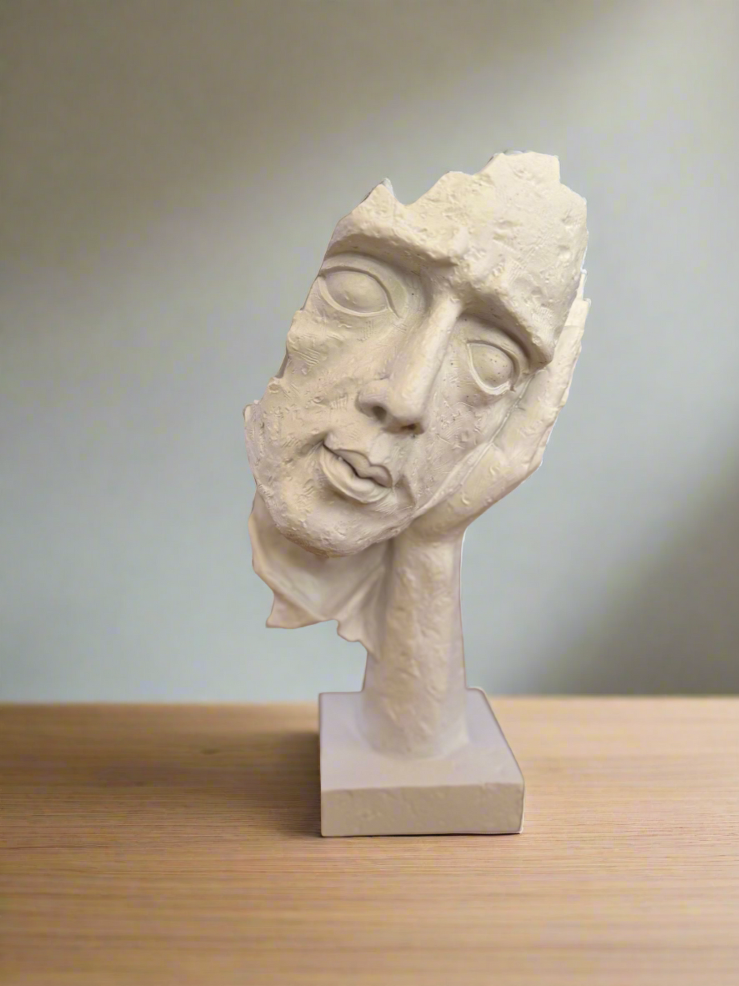 Statuette - a thoughtful man