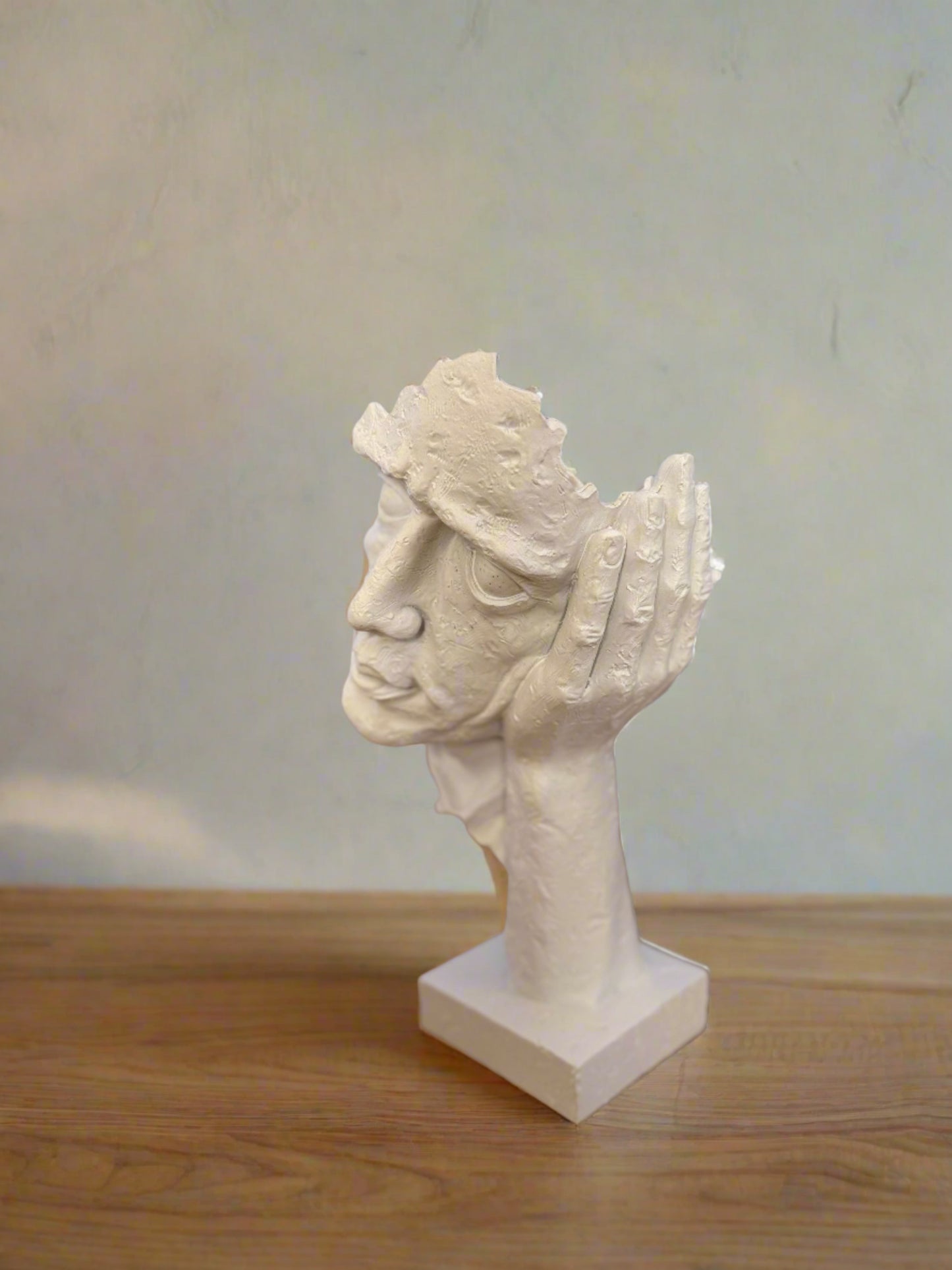 Statuette - a thoughtful man
